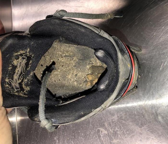 Shoe affected by fire damage