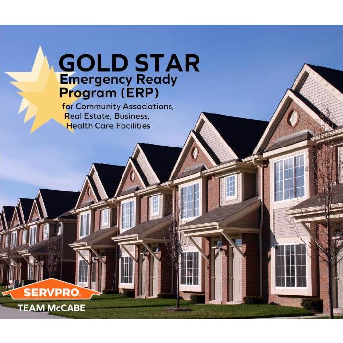 Gold Star ERP Logo above a photo of townhomes with a SERVPRO logo on the bottom left